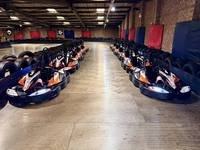 Karts waiting in the pit lane at Gridline Racing